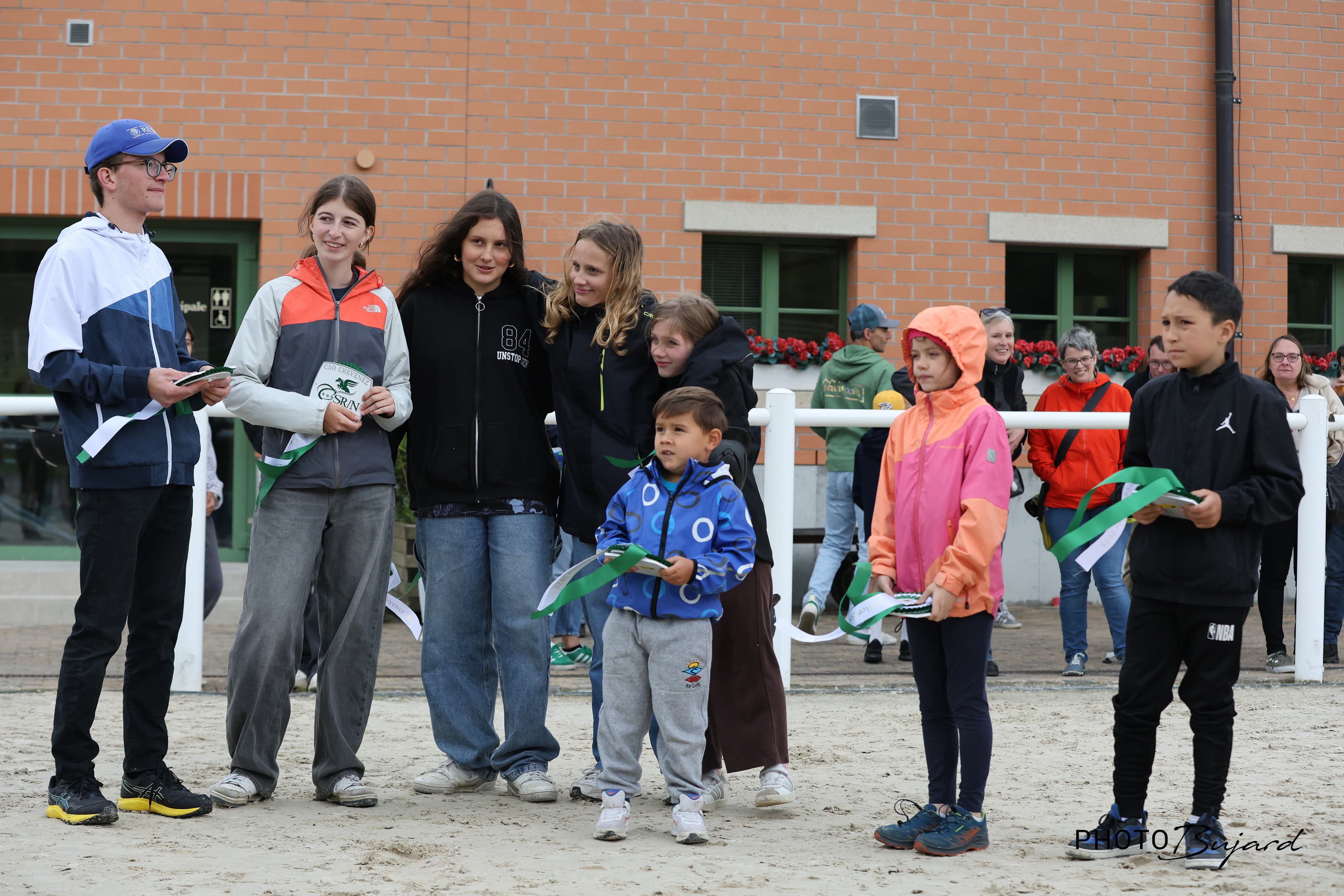 Children with their ribbons at the AJAFEC day
