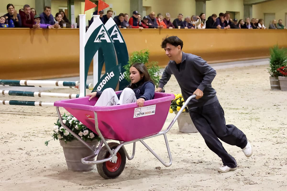 The wheelbarrow race during the halftime show