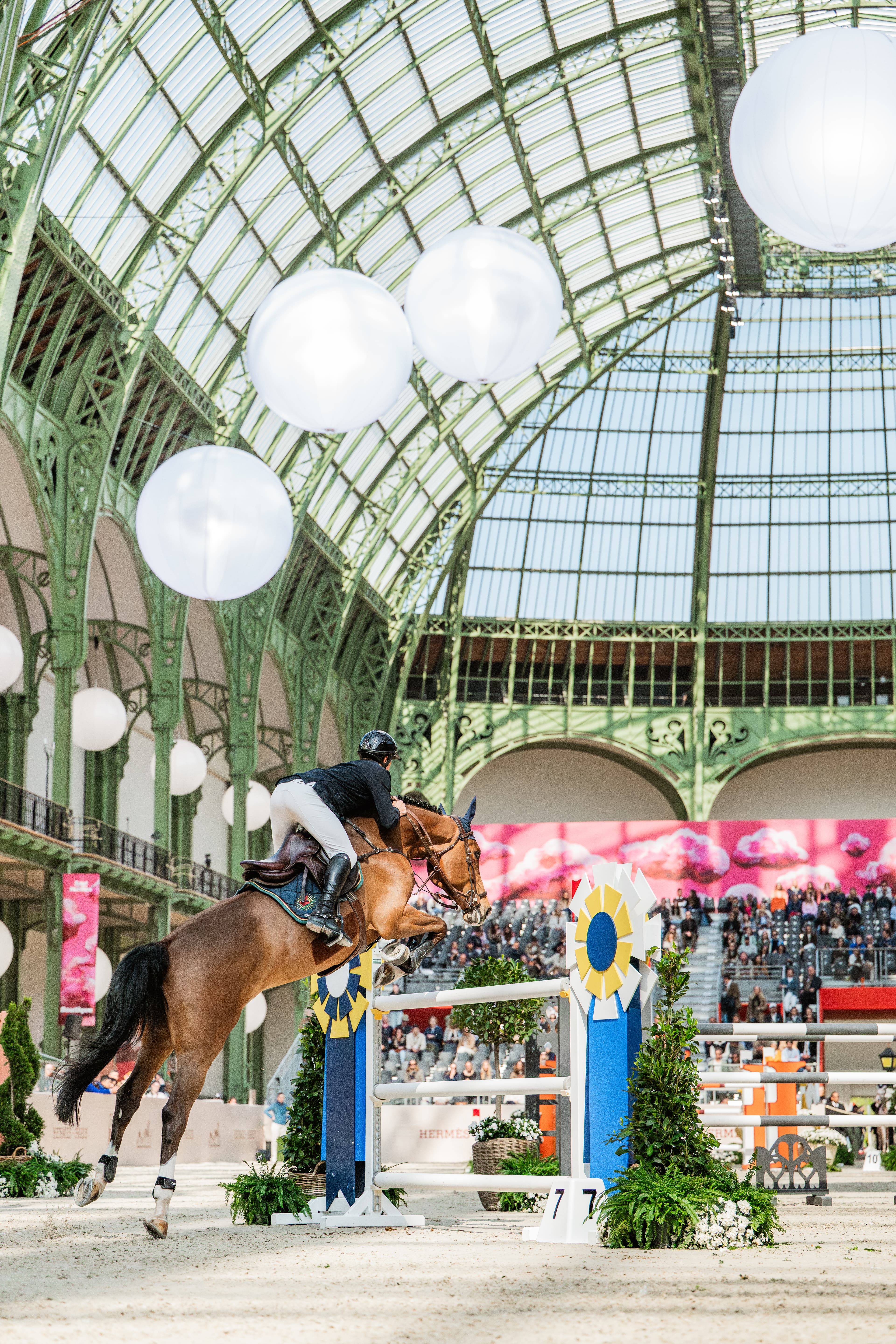 Competing under the glass roof of the Grand Palais in Paris